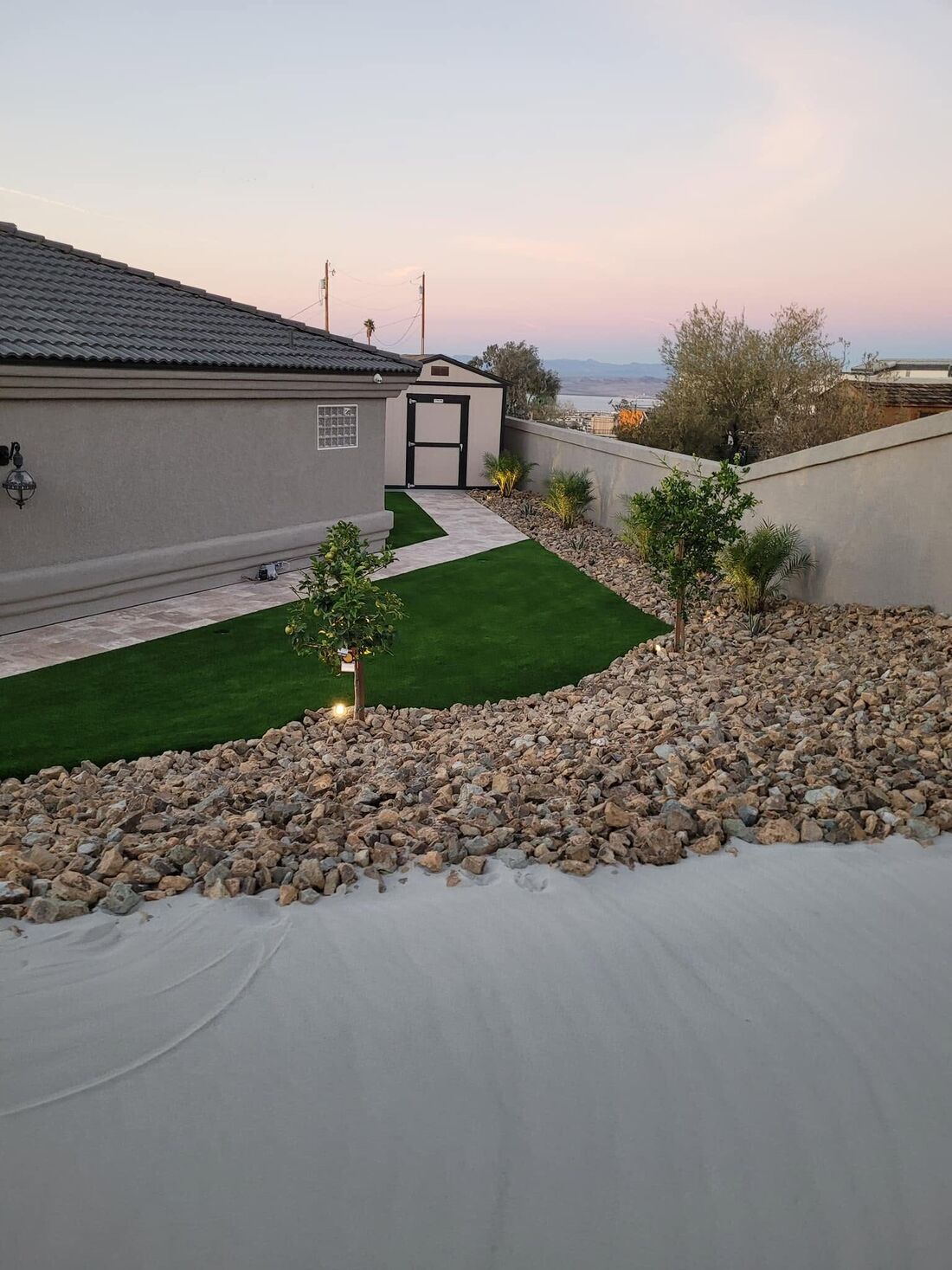 Paver Repair project by Havasu Pavers in Lake Havasu City — Side yard paver walk with turf border